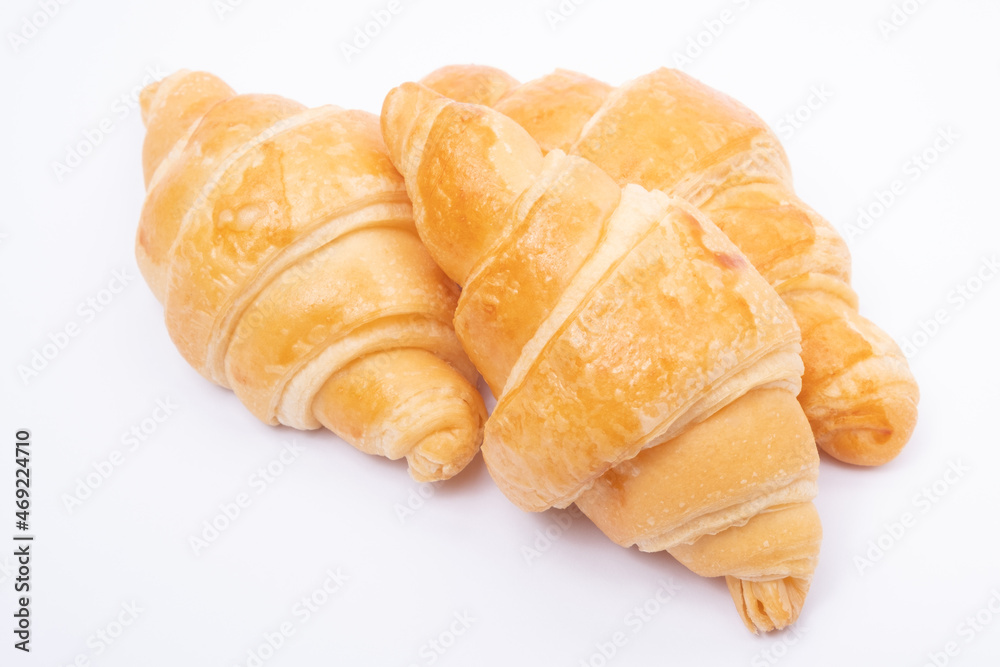 Croissant on a white background.French traditional bread. Croissant on a white background.French traditional bread.