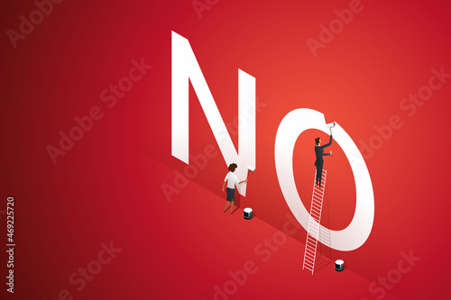 Woman writes no in white on red wall.