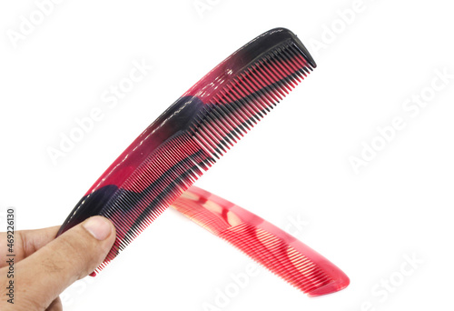 Hair comb isolated on white background with selective focus