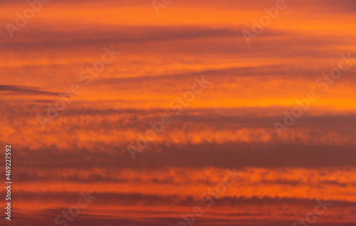 Beautiful view of sky with clouds at sunrise. Partly cloudy. Colorful sunset. Natural sky background texture, beautiful color.