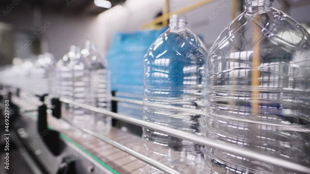 Automatic line for filling 5 liter PET bottles. Automatic line for filling 5 liter PET bottles.