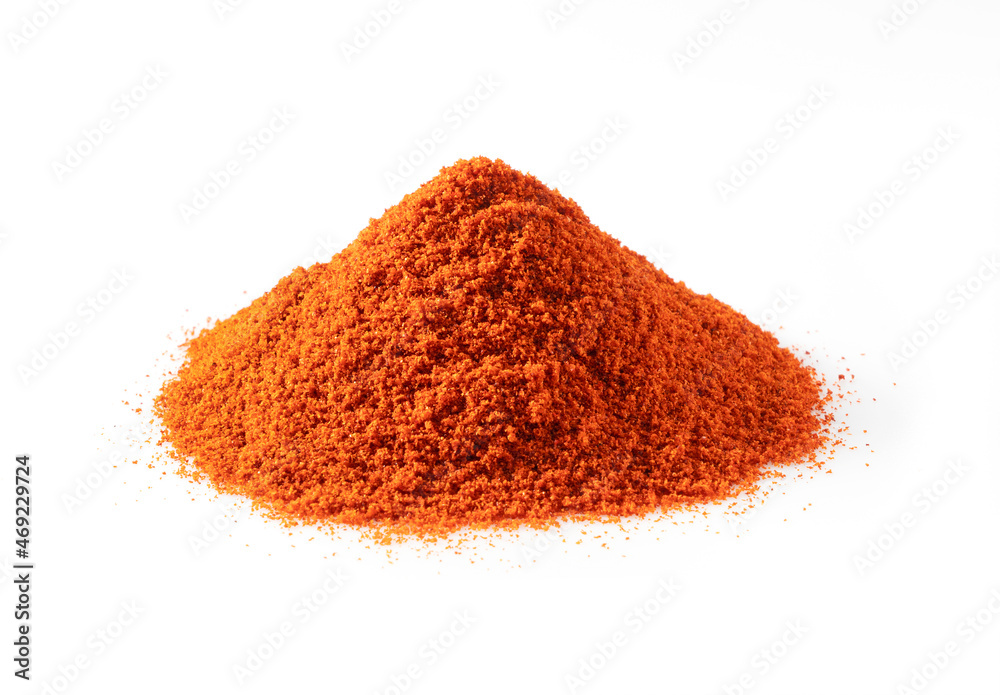 Red pepper powder on a white background Red pepper powder on a white background