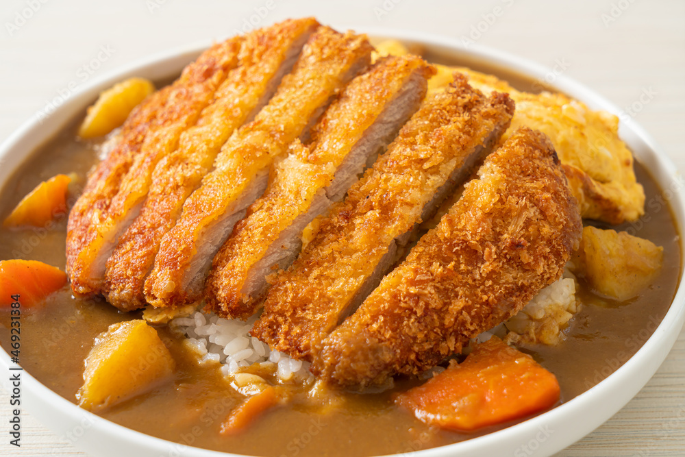 curry rice with fried pork cutlet and creamy omelet curry rice with fried pork cutlet and creamy omelet