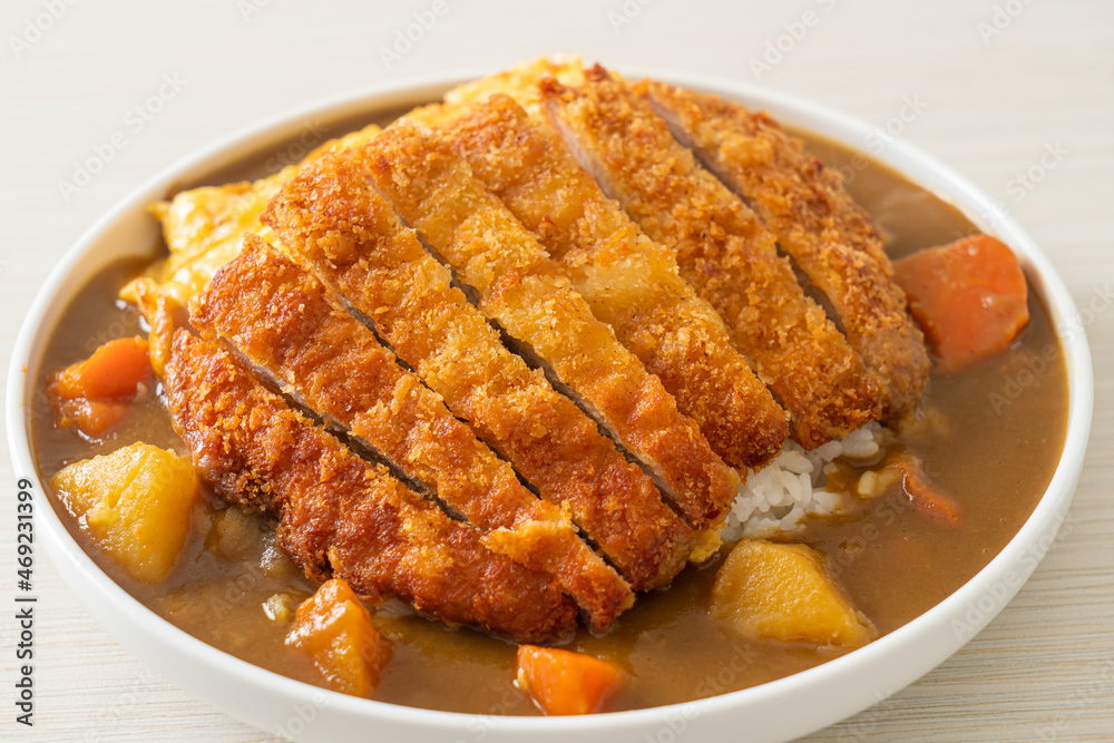 curry rice with fried pork cutlet and creamy omelet curry rice with fried pork cutlet and creamy omelet