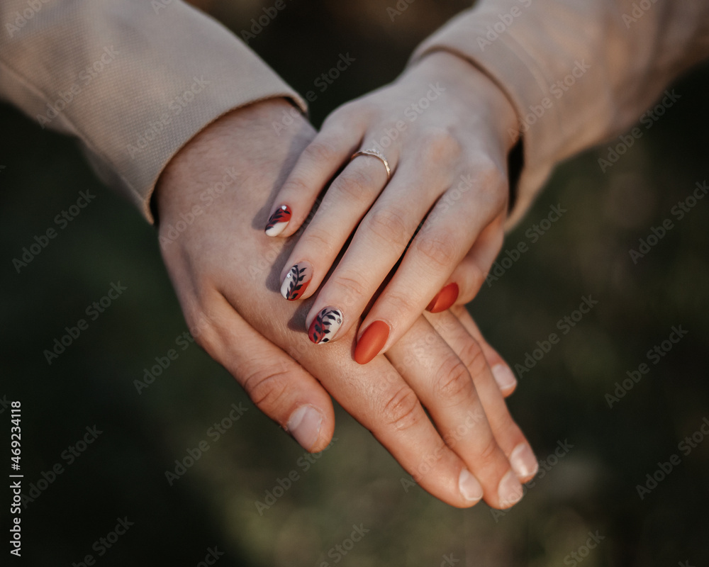 bride and groom holding hands