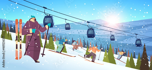 people skiing men women tourists doing activities winter vacation concept snowfall landscape background