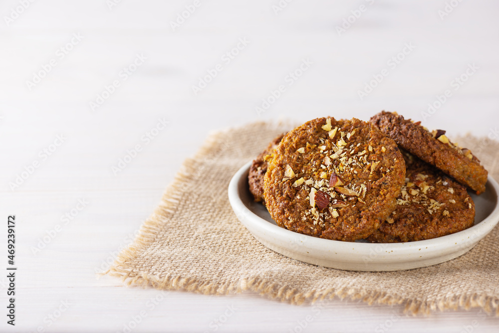 Homemade quinoa cookies in a bowl. Sugar, gluten and lactose free, vegan. Horizontal orientation, copy space. Homemade quinoa cookies in a bowl. Sugar, gluten and lactose free, vegan. Horizontal orientation, copy space.
