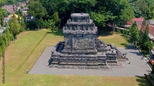 Stone building of Mendut temple, aerial drone orbit shot photo