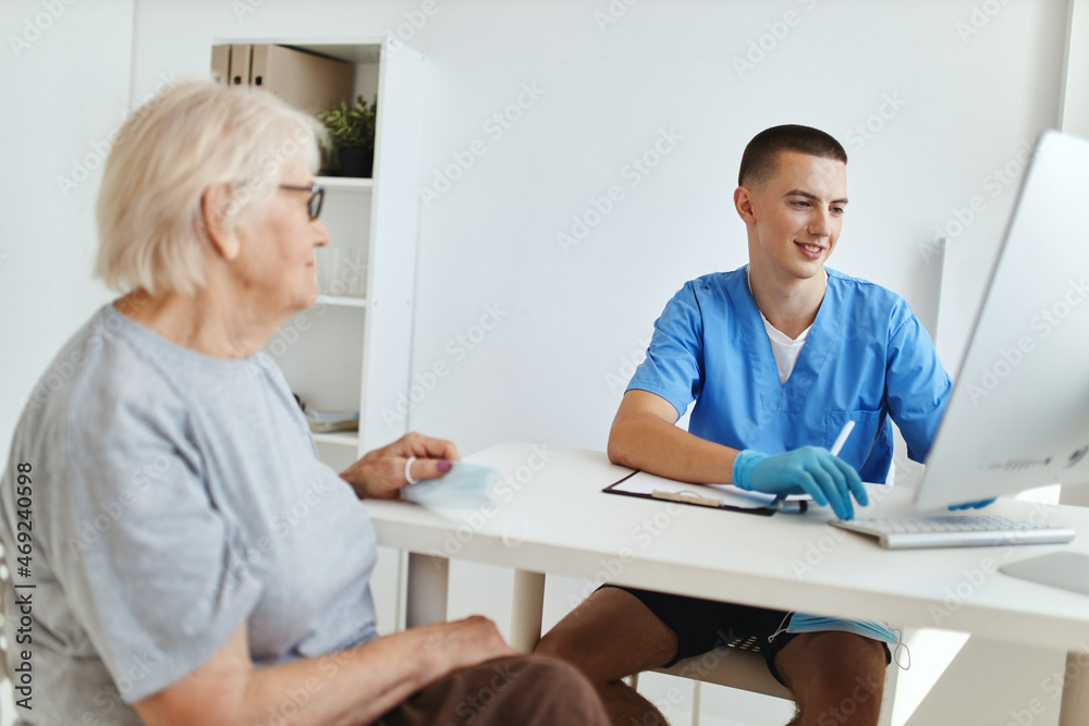 elderly woman patient at the doctor's appointment hospital visit elderly woman patient at the doctor's appointment hospital visit