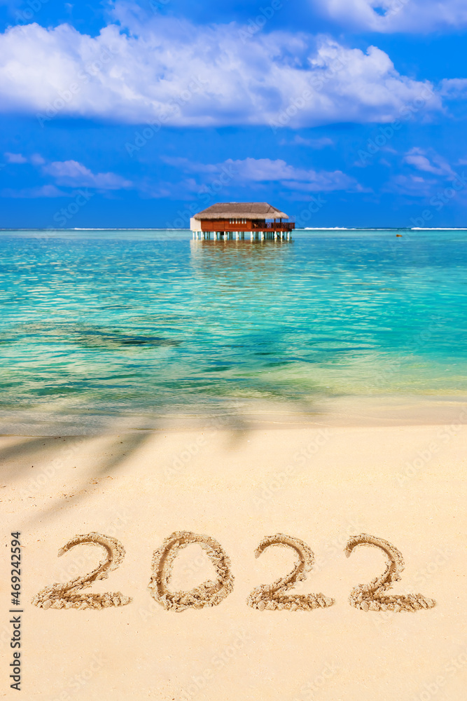 Fototapeta premium Numbers 2022 on beach
