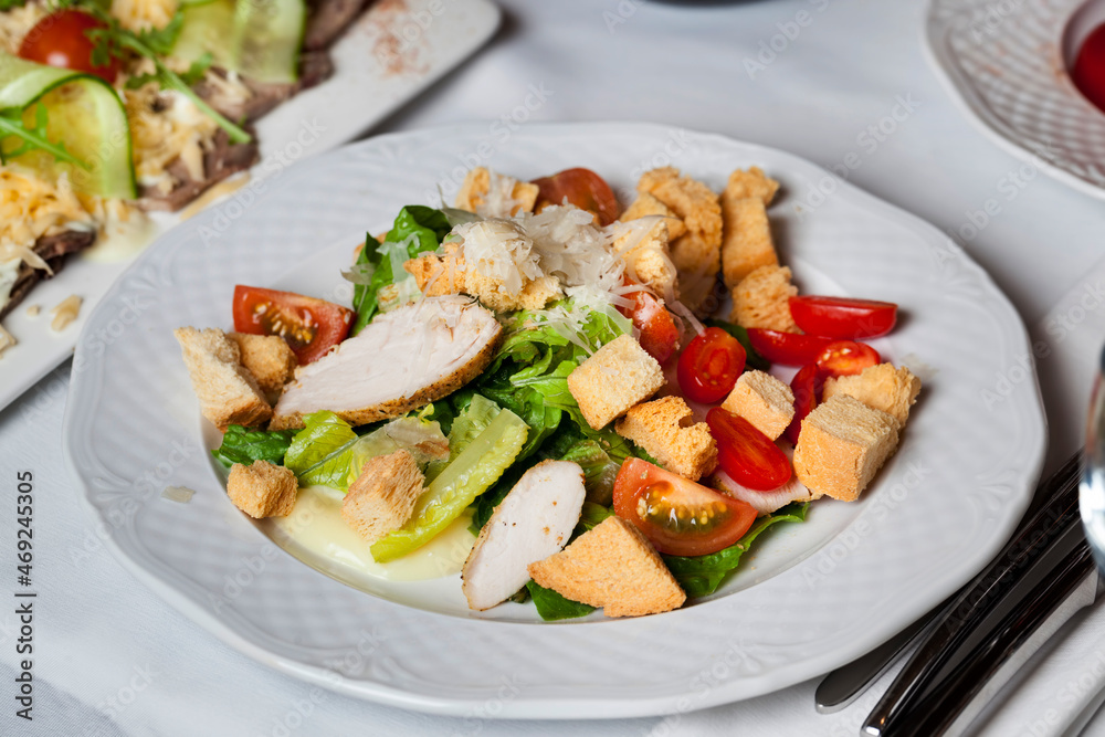salad of baked chicken meat, individual salad
