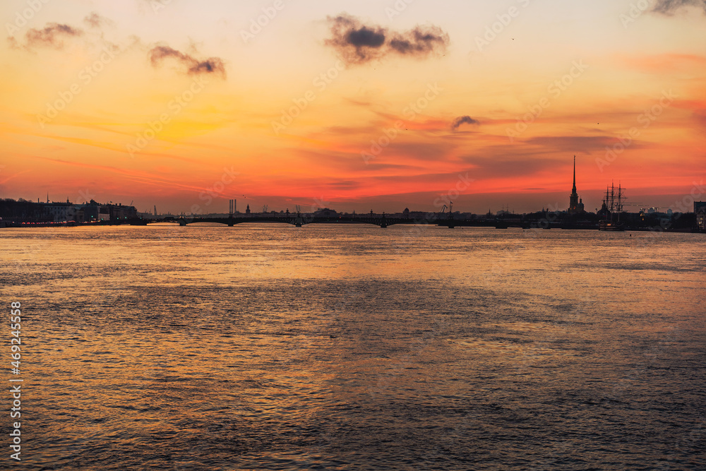 sunset in saint-petersburg. View on Neva river and peter and paul castle
