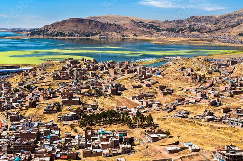 View of Puno with Lake Titicaca in Peru, South America