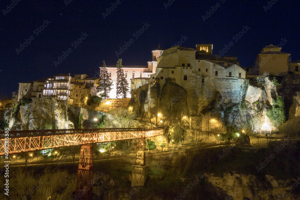 Homes night along cliff Cuenca, Spain
