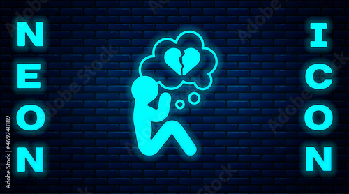 Glowing neon Broken heart or divorce icon isolated on brick wall background. Love symbol. Valentines day. Vector