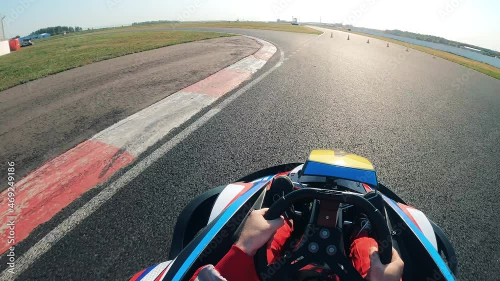 Go-cart is being driven along the circuit