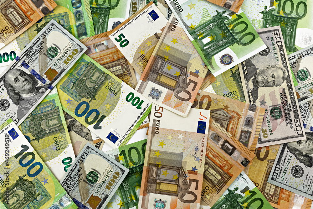 dollar and euro bills close-up. top view money background. business and financial concept