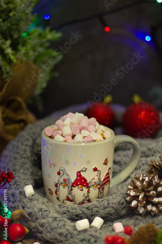 Obraz na plátně Celebrate winter's joy with this captivating tableau, spotlighting a festive mug, radiant berries, intricate pinecones, and a jovial plush figure keeping a watchful eye