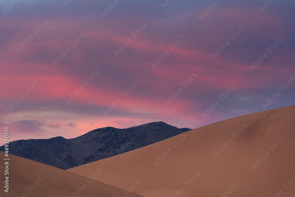 Sand dune under the expressive sky