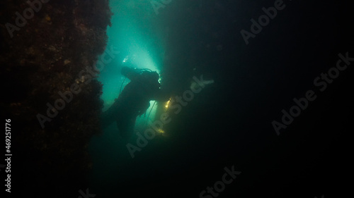 scuba diver at night