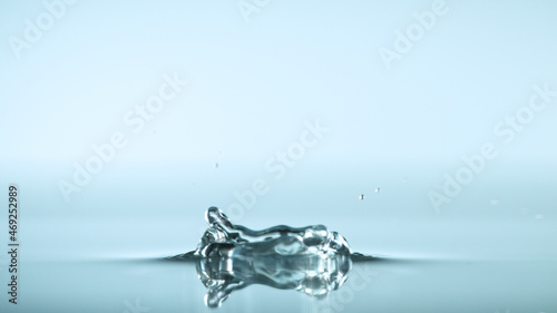 Water splash isolated on white background, nacro shot.