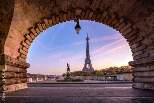 Pont de Bir-Hakeim and Eiffel Tower at sunrise, Paris, France photo