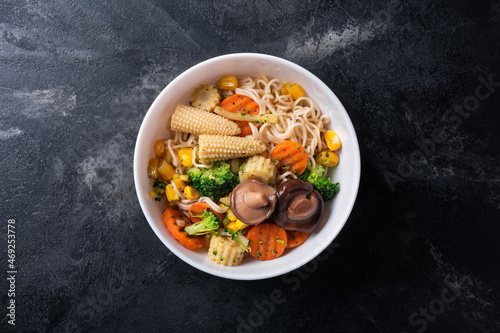 Traditional dish of Asian cuisine: noodles with shiitake mushrooms and vegetables