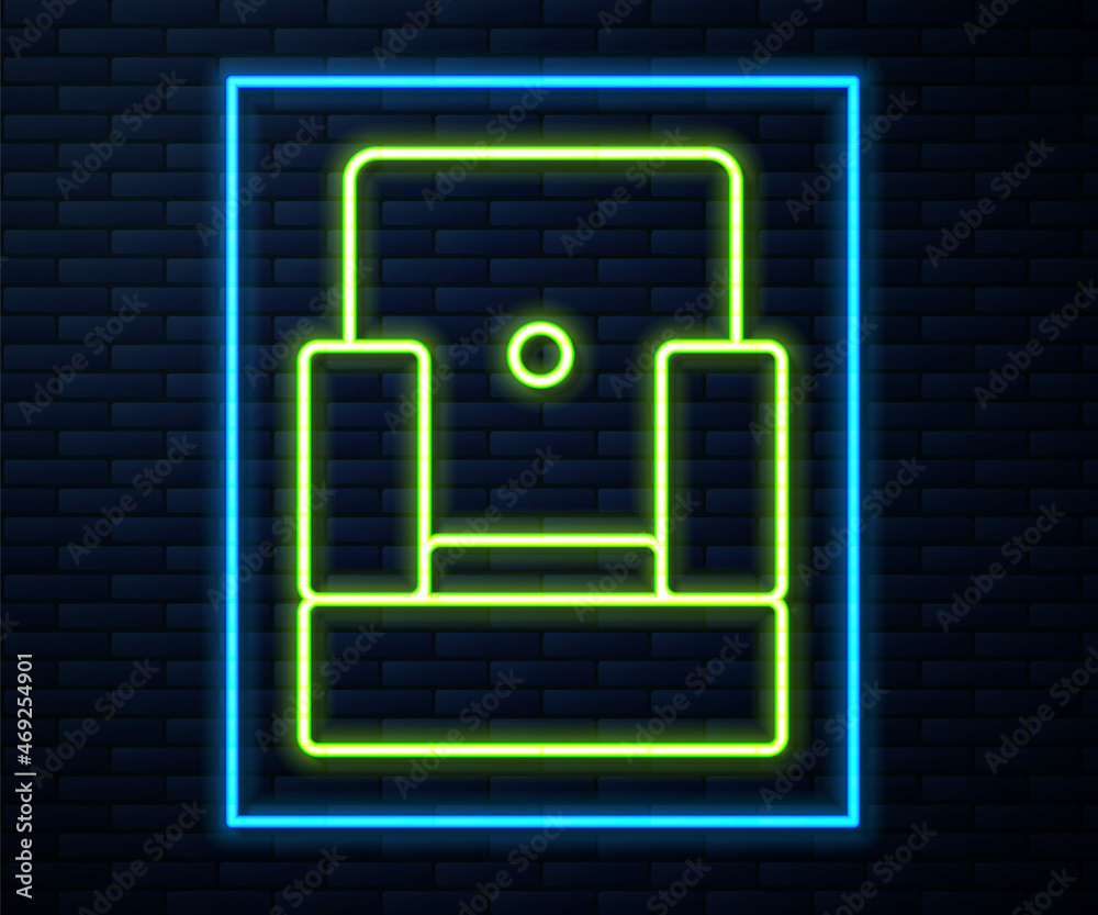 Glowing neon line Cinema chair icon isolated on brick wall background. Vector