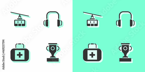 Set Award cup, Cable car, First aid kit and Winter headphones icon. Vector