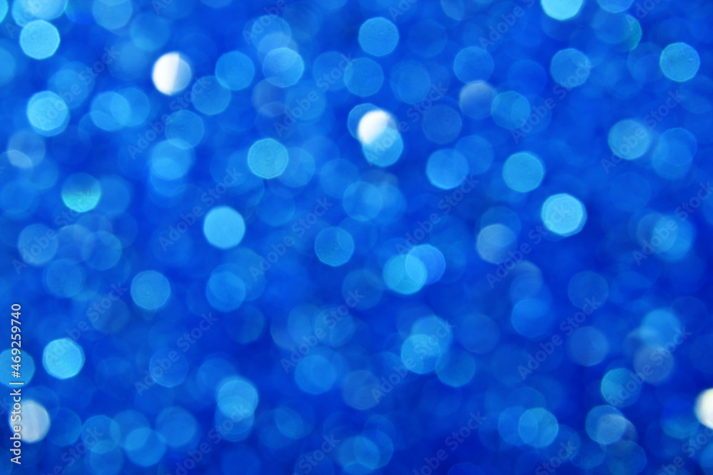 Abstract background of blue bokeh lights