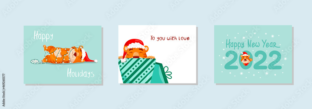 Set of Christmas cards with cute cartoon red striped tigers. Christmas and Chinese New Year greetings.