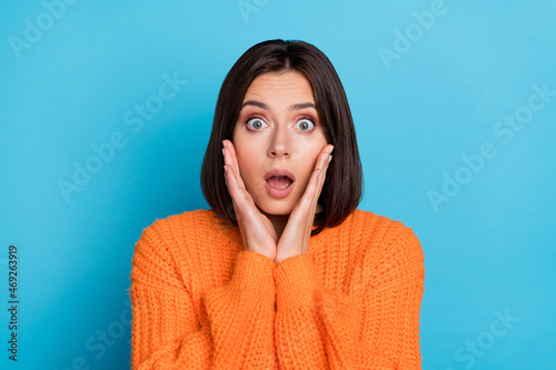 Portrait of attractive worried nervous puzzled confused stunned girl staring eyes sudden news isolated over bright blue color background