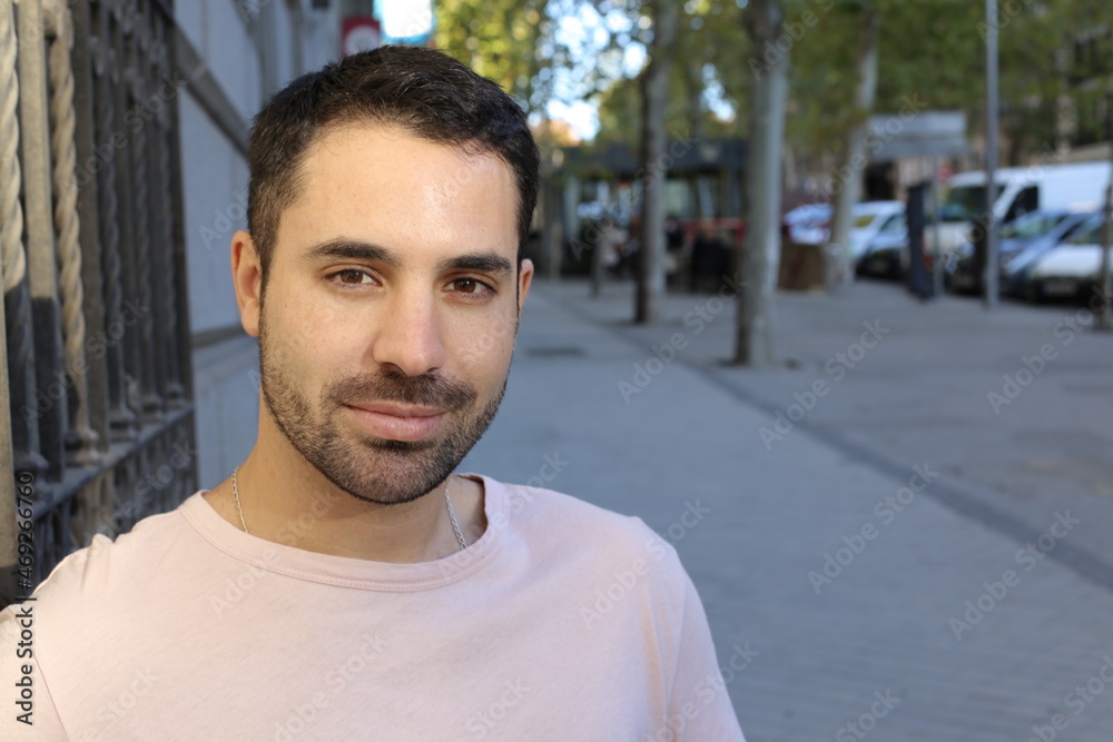 Good looking man headshot outdoors Good looking man headshot outdoors