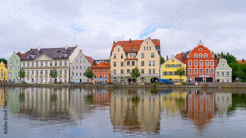 City buildings reflecting in water, Landshut, Germany