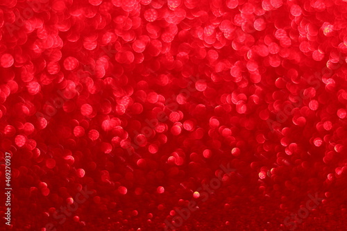 Illuminated Shiny Red Defocused Glitter With Bokeh And Gradient Suitable For Background