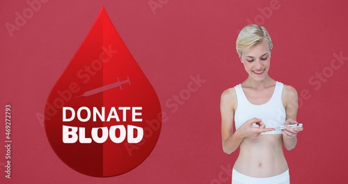 Animation of donate blood text, syringe and drop logo, with smiling woman doing pinprick blood test photo