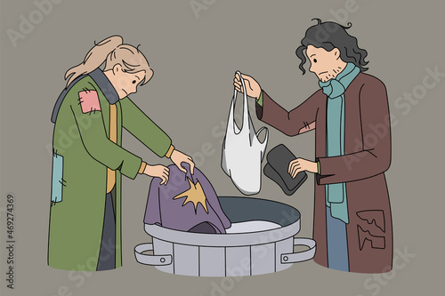 Homeless people look for clothes in trash can on streets. Poor needy beggars find clothing in waste outdoor. Homelessness and poverty. Refugee problem concept. Flat vector illustration. 