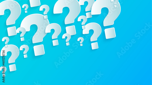Blue background with question mark. paper question marks large and small on bright blue background.