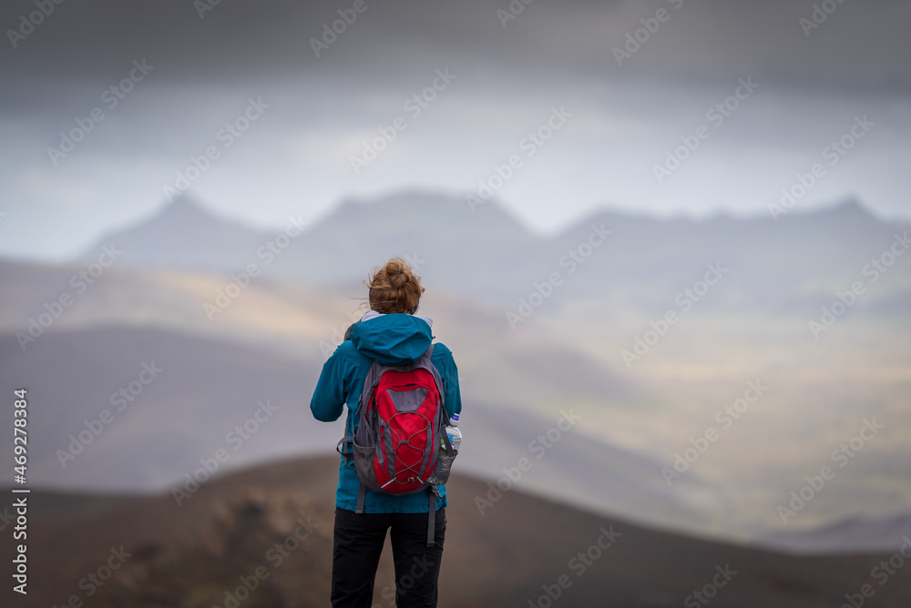 Hiking adventures young girl in Icelands highlands. Hiking adventures young girl in Icelands highlands.
