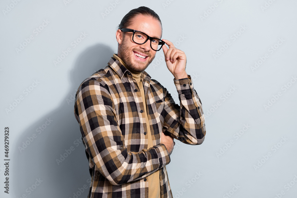 Profile side photo of young man eyewear smart banker attorney ceo isolated over grey color background Profile side photo of young man eyewear smart banker attorney ceo isolated over grey color background