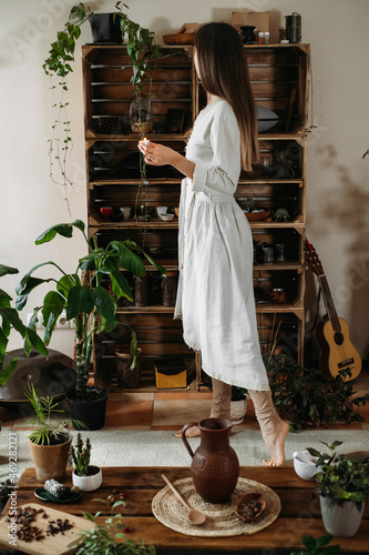 Fényképezés Cacao ceremony in atmospheric space with green plants and candles