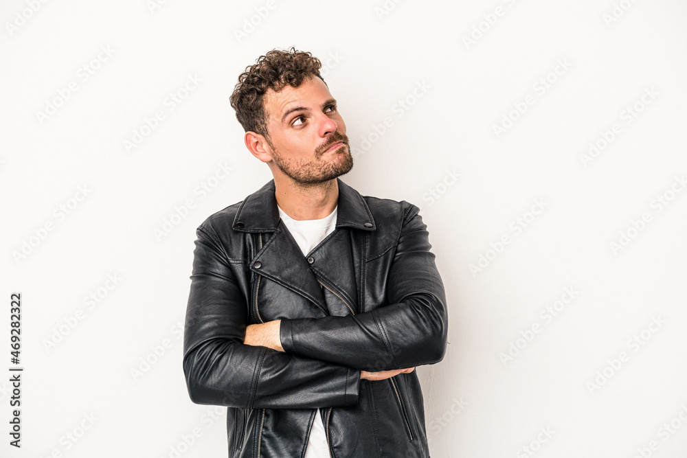 Young caucasian man isolated on white background dreaming of achieving goals and purposes Young caucasian man isolated on white background dreaming of achieving goals and purposes