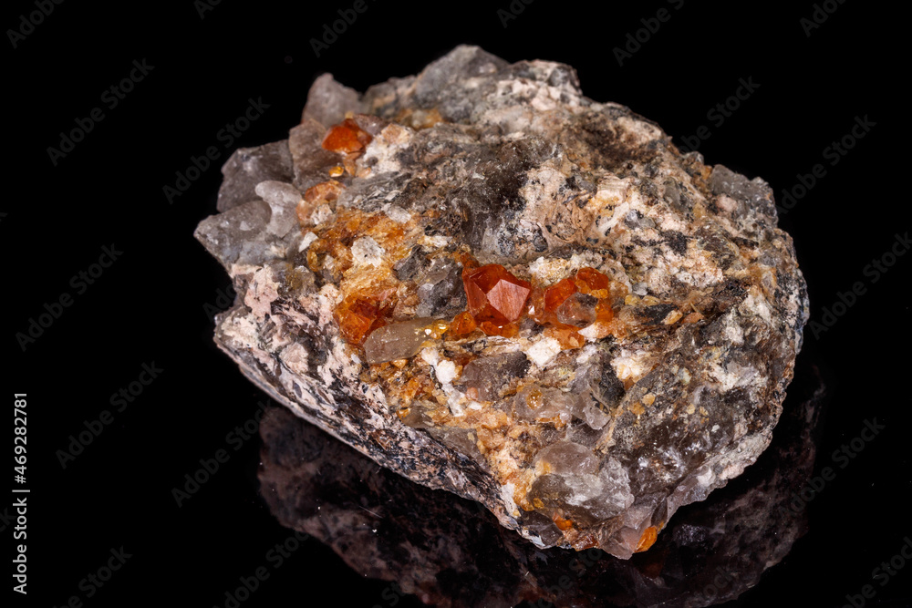 macro mineral stone Grossular, Garnet, Epidote on a black background macro mineral stone Grossular, Garnet, Epidote on a black background