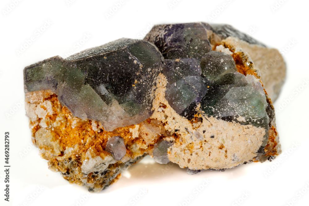 macro mineral fluorite stone on white background macro mineral fluorite stone on white background