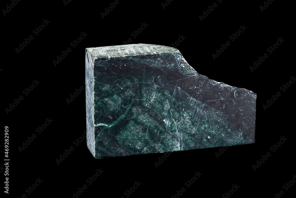 Macro stone Nephrite mineral on black background Macro stone Nephrite mineral on black background