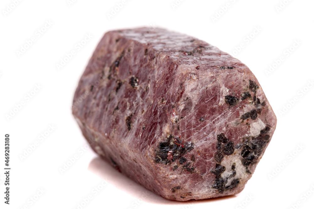 Macro mineral stone Ruby in the breed a white background Macro mineral stone Ruby in the breed a white background