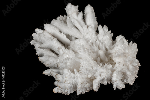 Macro stone Calcite mineral on a black background