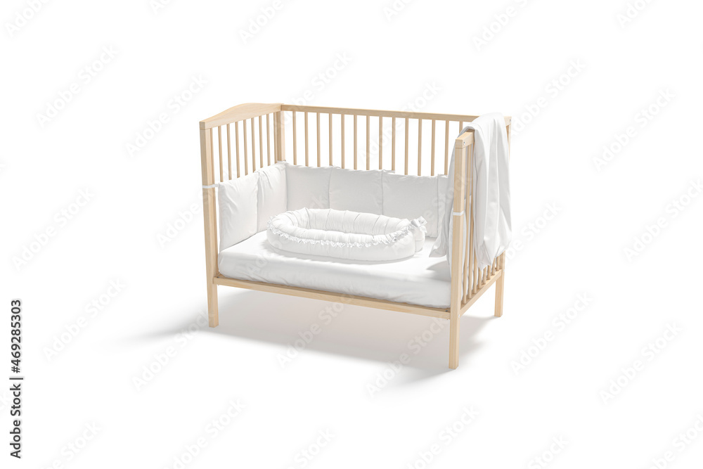 Blank wood cot with white crib sheet and nest mockup Blank wood cot with white crib sheet and nest mockup