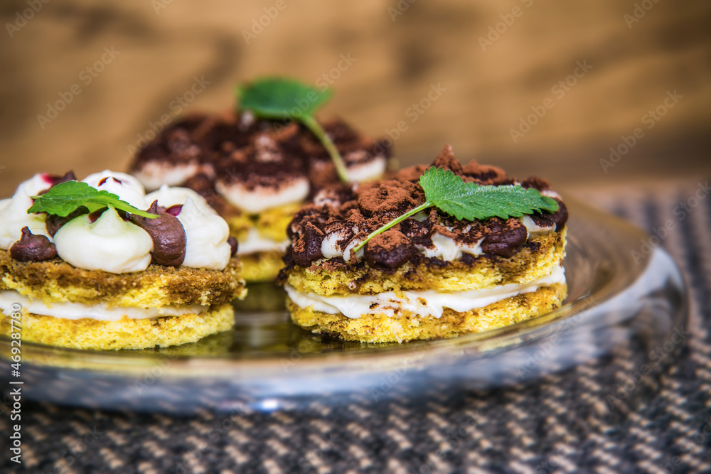 Delicious chocolate sweet dessert with nuts and mint.  Close up