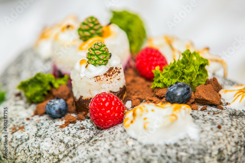 Delicious sweet dessert with fresh fruits. Close up